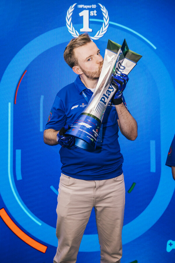 Finalist Floris Wijers of the Netherlands celebrates winning at the global final of Player 0.0 sim racing competition, hosted at the Heineken Experience on December 06, 2023 in Amsterdam Finalist Floris Wijers of the Netherlands celebrates winning at the global final of Player 0.0 sim racing competition, hosted at the Heineken Experience on December 06, 2023 in Amsterdam