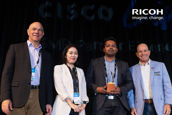 Ragavan Satkunam (second right), Head of Digital Services RICOH APAC receives the ‘Asia Pacific SMB Managed Service Partner of the Year’ award from Cisco representatives Andrew Sage, VP, Global Distribution & SMB Sales (first left), Michiko Kamata, Managing Director of Cisco Distribution & SMB Sales, Asia Pacific, Japan & Greater China (second left) and David West, SVP and President of Asia Pacific, Japan, and Greater China (first right) at Cisco Live in Melbourne, Australia. Ragavan Satkunam (second right), Head of Digital Services RICOH APAC receives the ‘Asia Pacific SMB Managed Service Partner of the Year’ award from Cisco representatives Andrew Sage, VP, Global Distribution & SMB Sales (first left), Michiko Kamata, Managing Director of Cisco Distribution & SMB Sales, Asia Pacific, Japan & Greater China (second left) and David West, SVP and President of Asia Pacific, Japan, and Greater China (first right) at Cisco Live in Melbourne, Australia.