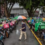 P-hailing riders call for govt intervention after sudden drop in delivery wage