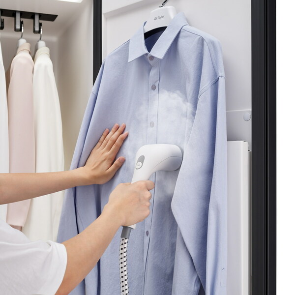 A first for the LG Styler lineup, the new model features a handheld, high-pressure steamer that makes it easier to remove wrinkles from shirts and other garments, and saves the hassle of having to use a separate iron. A first for the LG Styler lineup, the new model features a handheld, high-pressure steamer that makes it easier to remove wrinkles from shirts and other garments, and saves the hassle of having to use a separate iron.