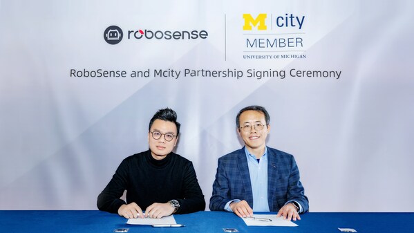 Mark Qiu, Executive President and Executive Director of RoboSense, joins Henry Liu, director of Mcity and a professor of Civil and Environmental Engineering at U-M, for the signing ceremony formalizing the partnership between RoboSense's partnership and Mcity. Mark Qiu, Executive President and Executive Director of RoboSense, joins Henry Liu, director of Mcity and a professor of Civil and Environmental Engineering at U-M, for the signing ceremony formalizing the partnership between RoboSense's partnership and Mcity.