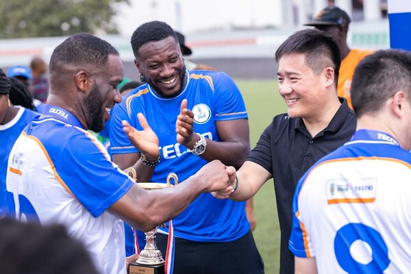 TECNO General Manager Shaking Hands with Football Legends