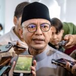 Bersatu info chief tells Fahmi to ‘watch his mouth’ after Muhyiddin accused of disinformation over Kelantan constitutional challenge