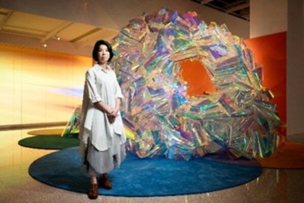 Artist Ms. Cheong Hoi I at GalaxyArt introducing her work "Pleased as Fruit Punch" welcomes audience into a colourful world in the form of an arched bridge.