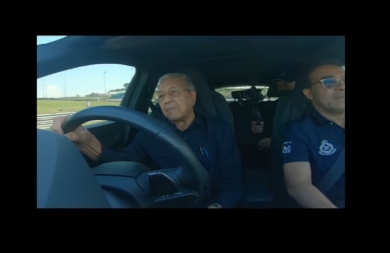 Dr Mahathir, ‘99-year-old car guy’ puts pedal to the metal and hits speeds over 150km/h at SIC 