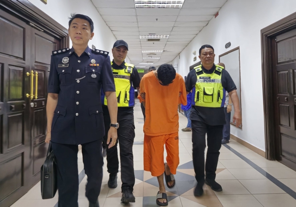 Kuching court extends remand to Dec 29 for Harimau Malay fan who admitted to killing woman to fund expenses for Asean Cup