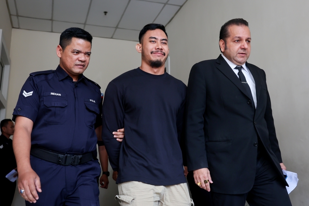 Freelance photographer pleads not guilty to assaulting fashion designers Razman Razmi at PJ event