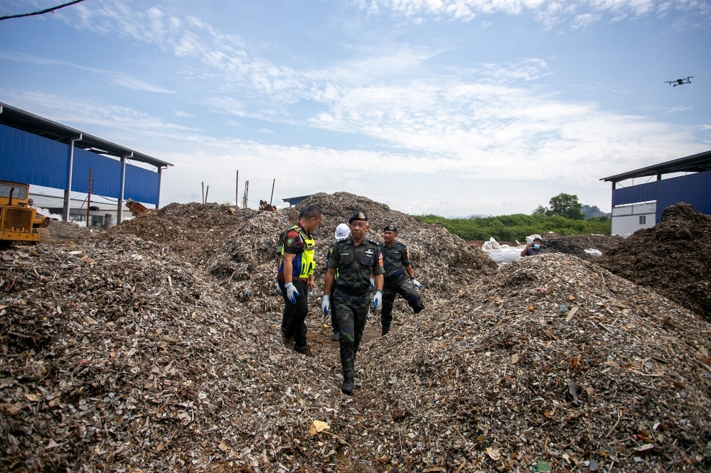 Cops and DOE seize RM3.8b e-waste in nationwide crackdown, arrest 538, including kids as young as two