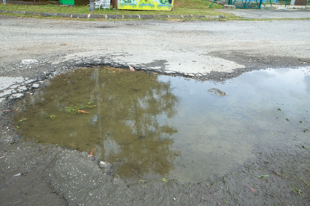 Why Malaysian roads remain in poor condition