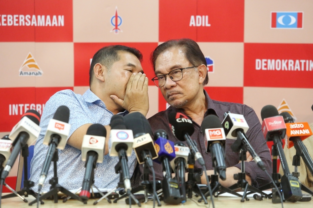 Anwar plays down Rafizi’s month-long leave as rumours fly, says he wants ‘some time off too’ 