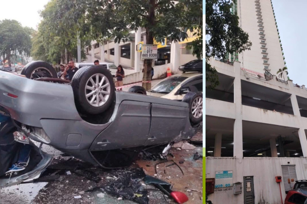 Vehicle plunges off third-floor parking deck in Old Klang Road; car wash worker seriously hurt