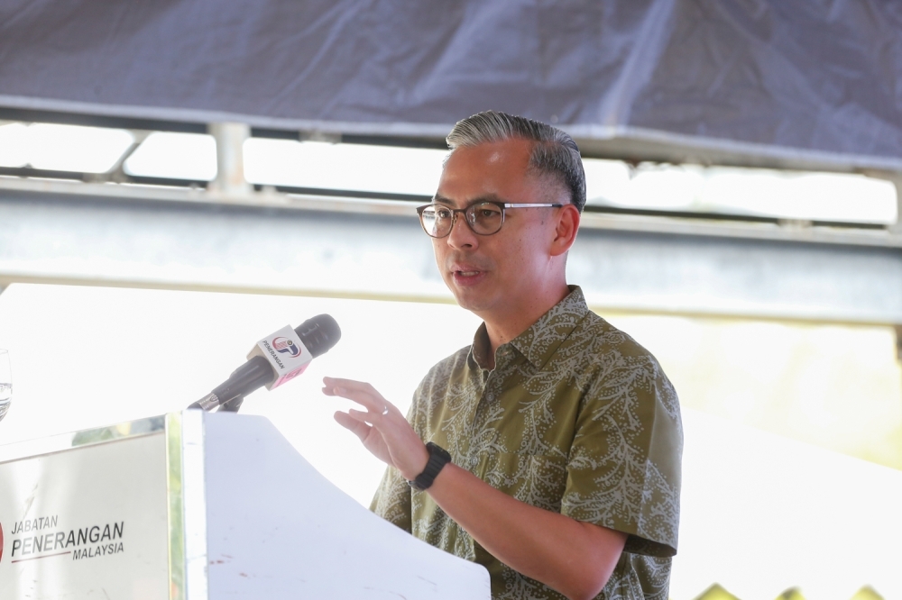 Fahmi shrugs off Rafizi’s podcast claim of losing Anwar’s support