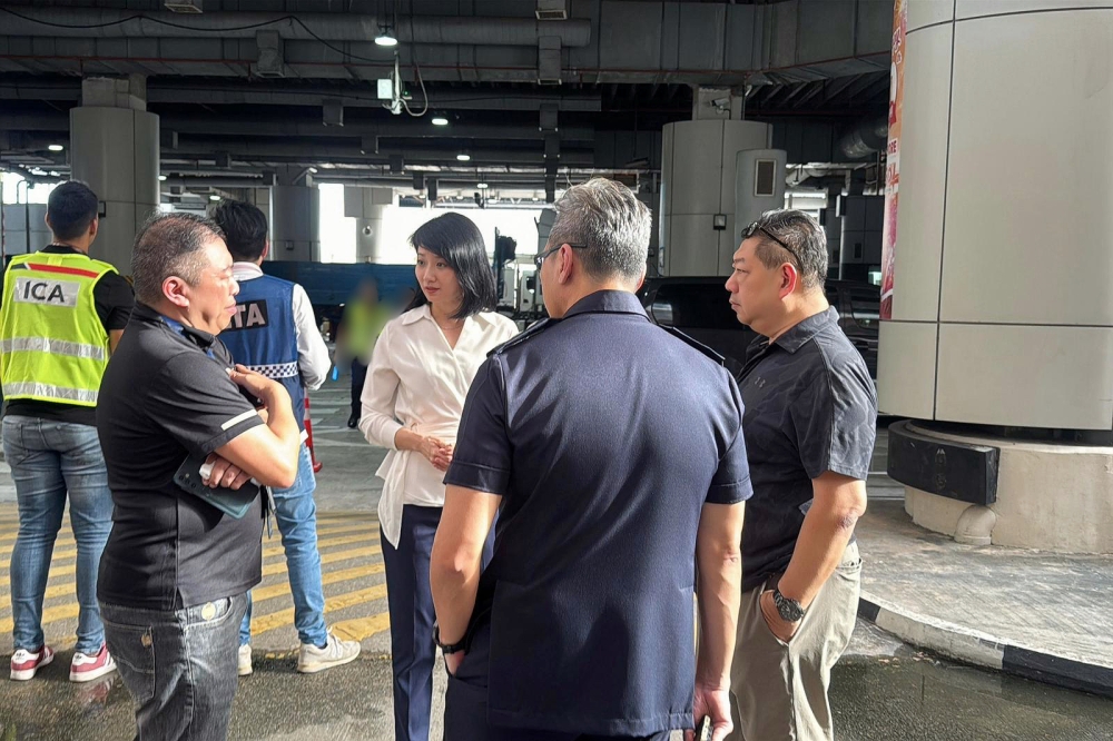 Outdated rules leave licensed Singapore-Johor taxi drivers idling as demand surges
