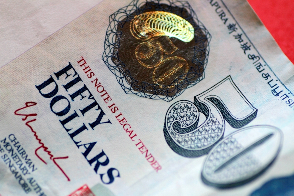 Father-son duo in dock over RM595m GST fraud in Singapore