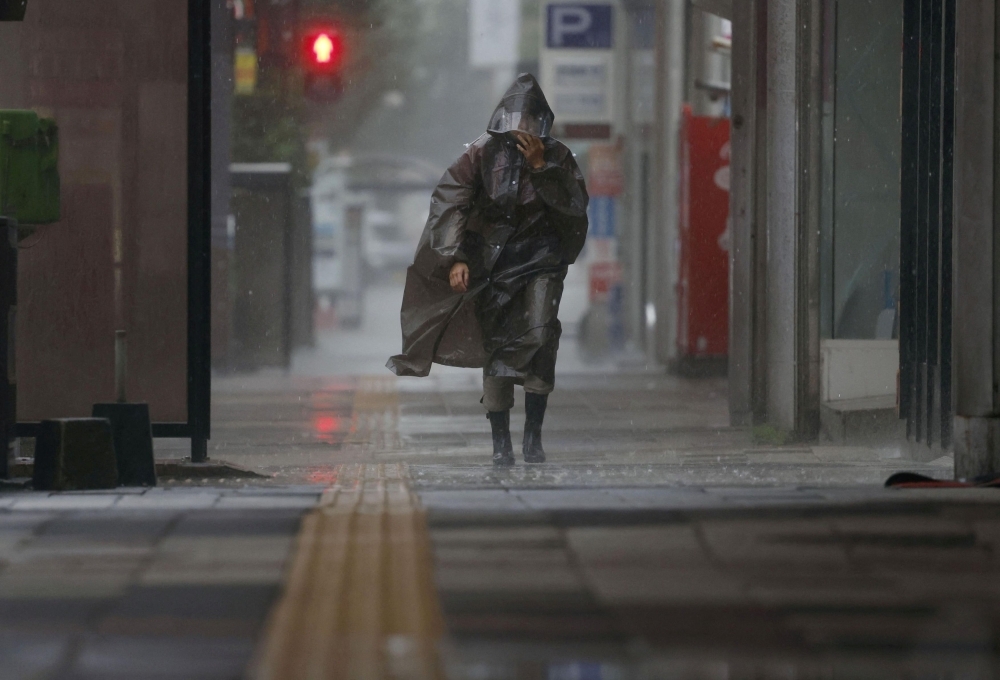 Japan cancels flights, orders evacuations as record rains lash Kagoshima