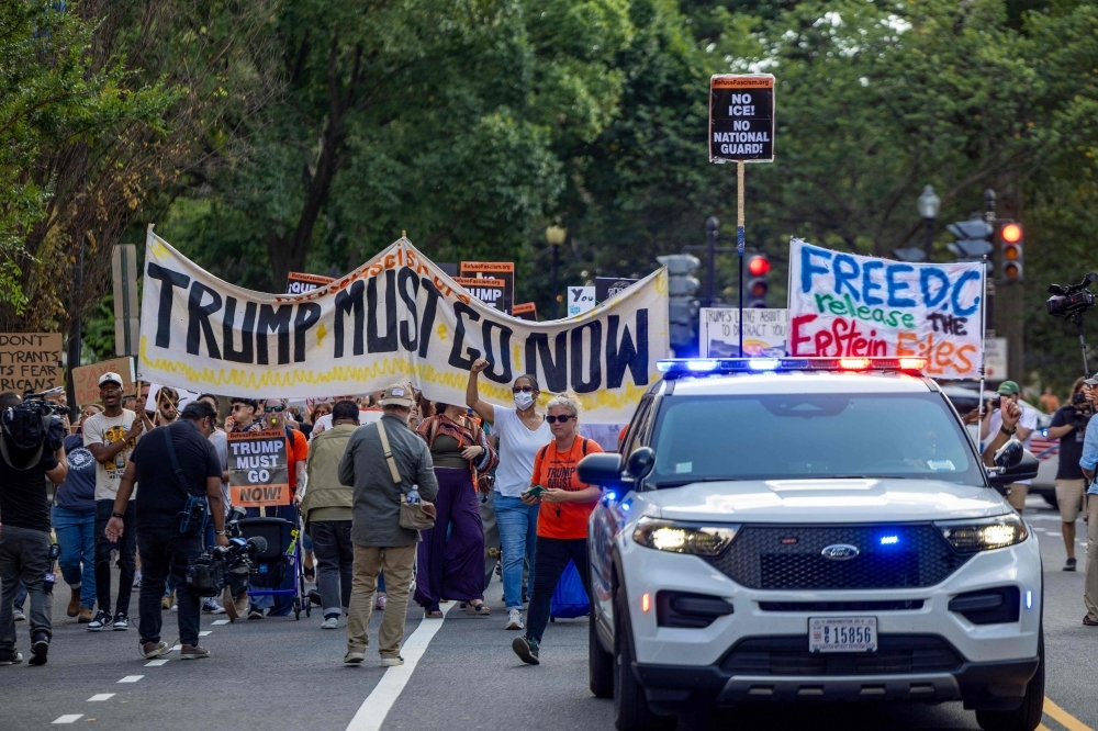 Trump sends troops, takes control of Washington DC police in crime crackdown