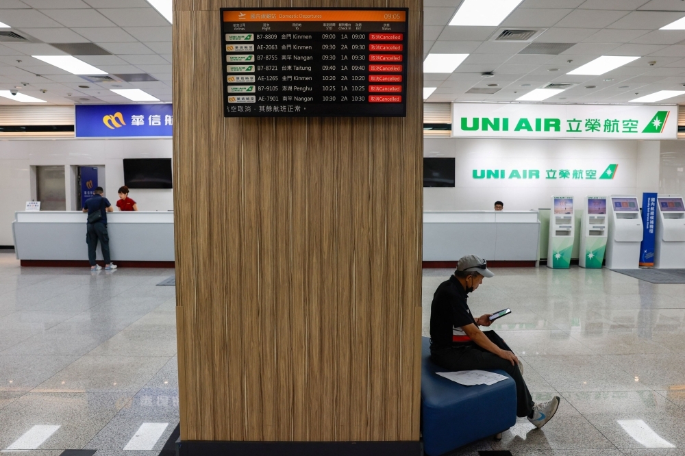 Southern Taiwan shuts down with evacuations and flight cancellations as Typhoon Podul approaches