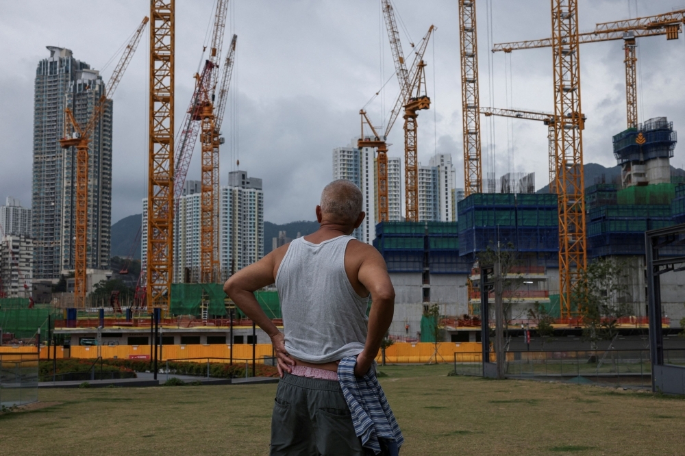 Fire sales and defaults deepen Hong Kong commercial real estate crisis