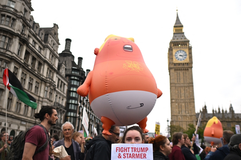 Thousands protest Trump’s UK visit as Windsor pageantry unfolds
