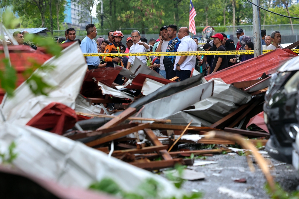 Cars wrecked, roofs blown off as thunderstorm hits Seri Cempaka PPR in Lembah Pantai