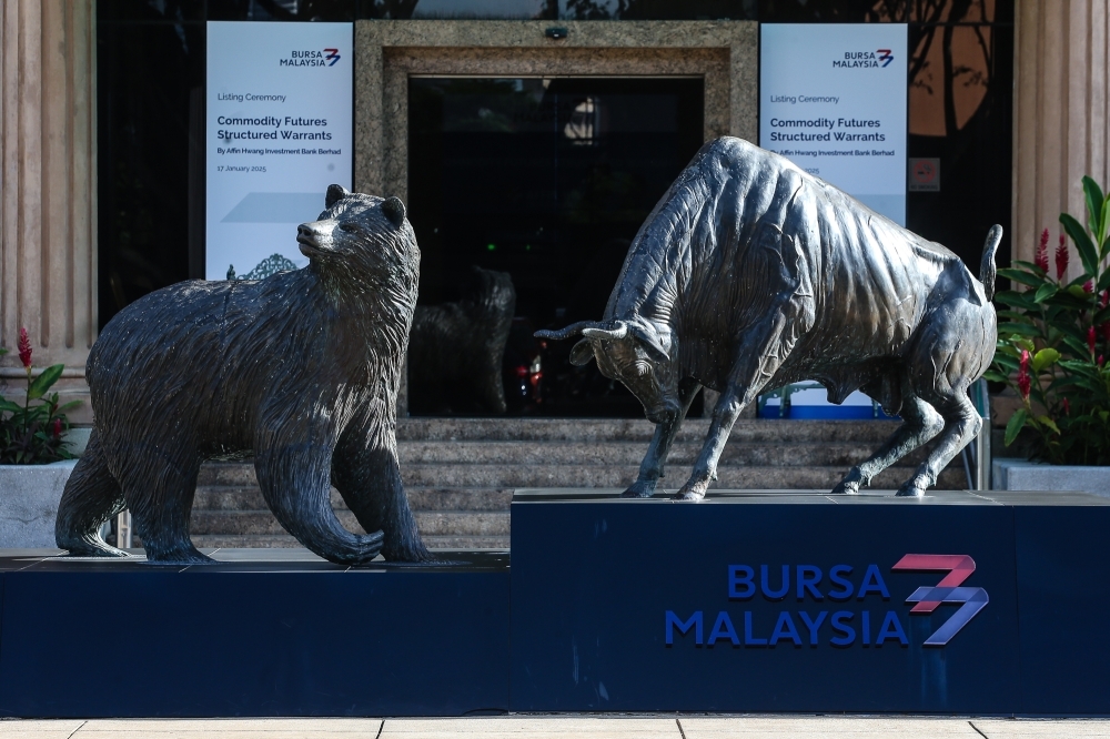 Bursa climbs in catch-up trade, KLCI adds four points