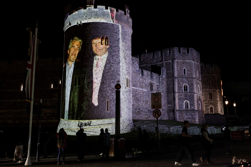 Protesters beam Epstein video onto Windsor Castle ahead of Trump’s UK visit