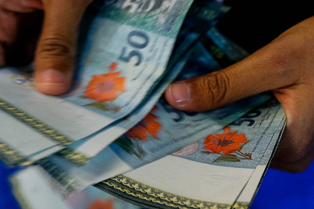 RM60,000 ‘robbery’ was an inside job, say police after Butterworth car salesman’s arrest