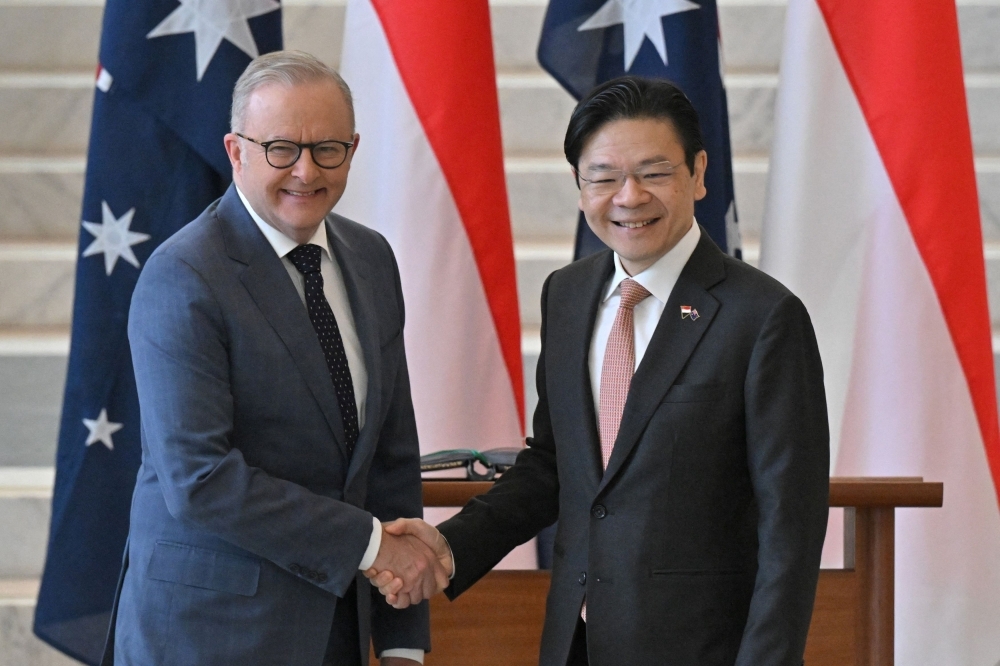 Australia’s PM discusses Optus outage linked to four deaths with Singapore PM