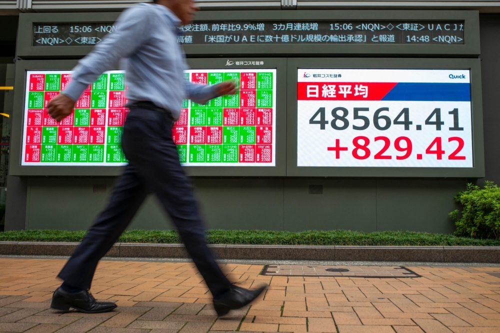 Asia markets wobble as tech bubble fears grow amid AI investment frenzy