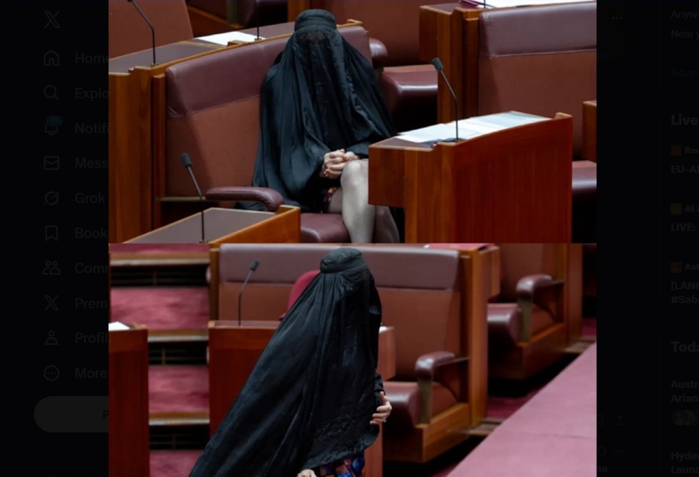 Far-right Australian politician sparks outrage by wearing burqa in parliament