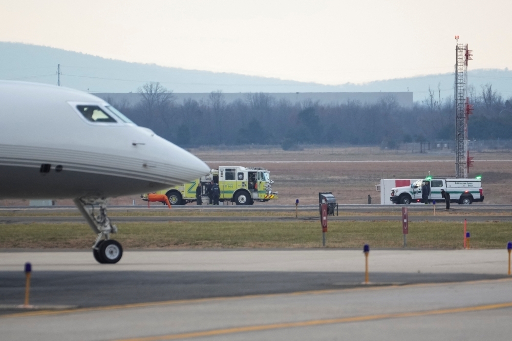 Fiery engine blast forces United Flight 803 back to Washington minutes after takeoff for Tokyo