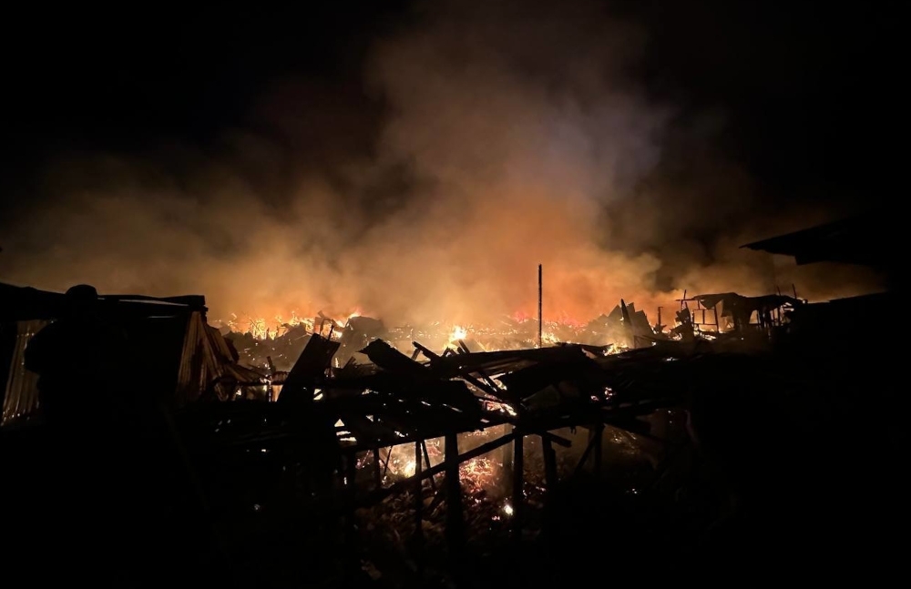 Fire engulfs Tawau water village in Sabah, residents leap into sea to escape flames