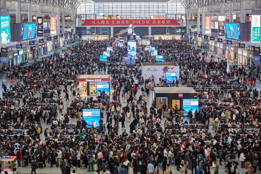 China logs 258 million rail trips halfway through Spring Festival travel season