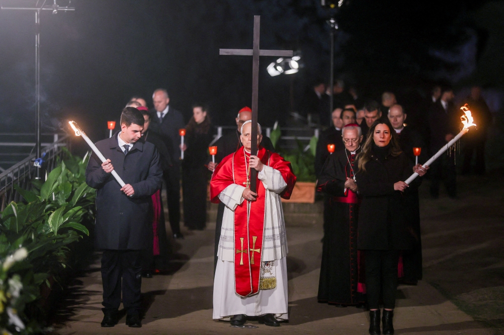 Pope Leo warns world leaders will answer to God at Colosseum Good Friday service