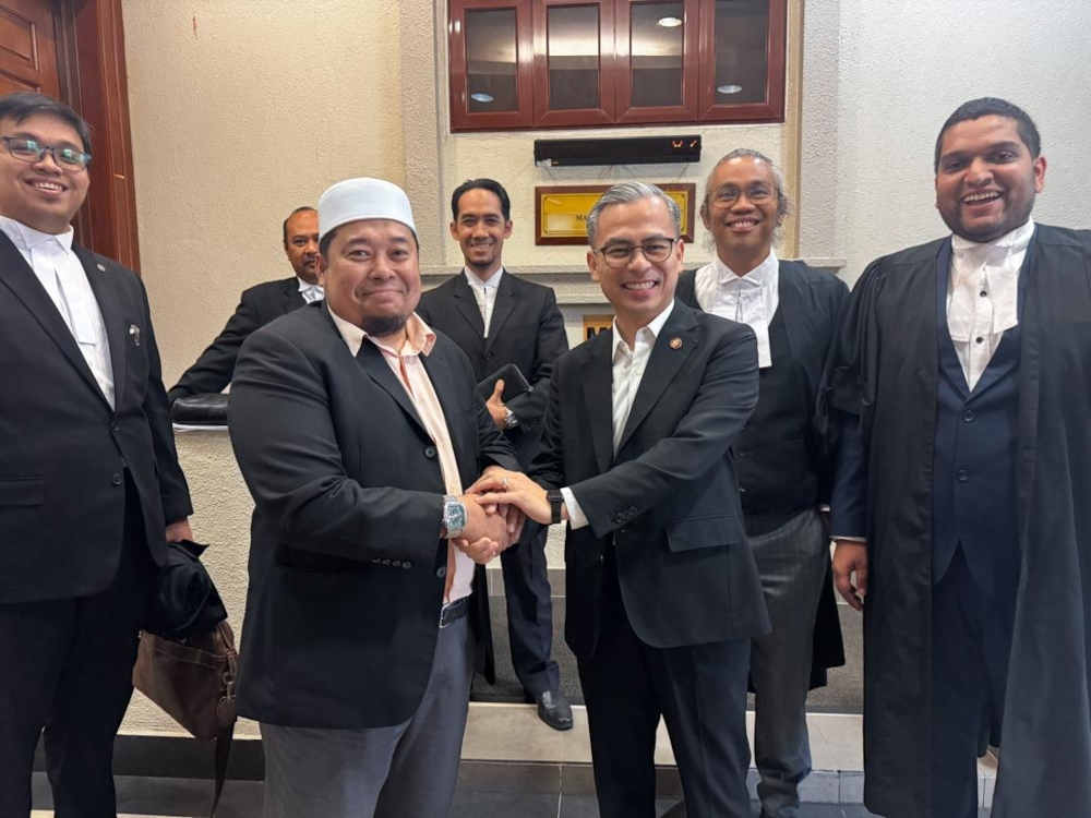 Man behind ‘N13 Kuang’ account admits false claim against Fahmi over mosque speech