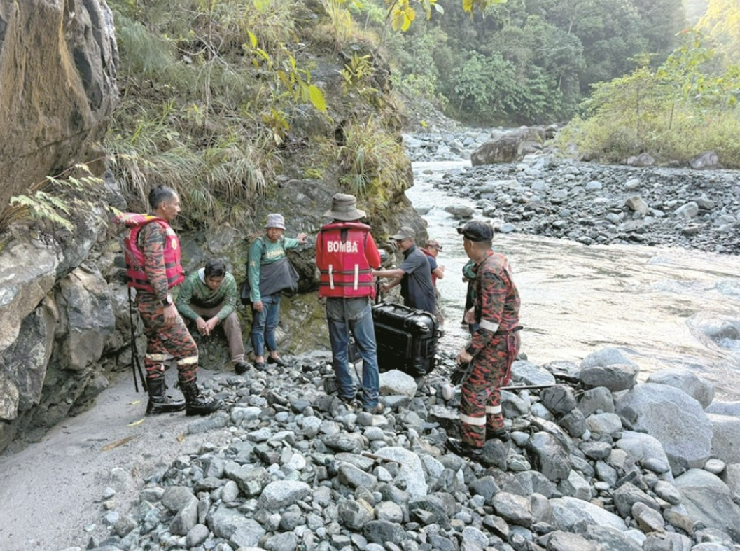 Firefighters battle darkness, steep terrain and dead torch batteries to rescue five stranded surveyors in Kota Belud