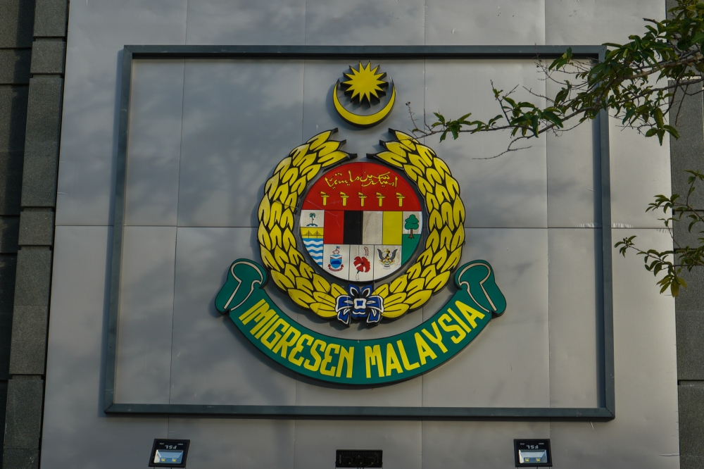 Immigration Dept arrests two Indonesians over fake security stamp syndicate in KL raids