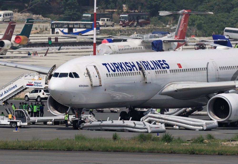Turkish Airlines A330 evacuated after landing‑gear fire shuts Kathmandu airport, passengers safe