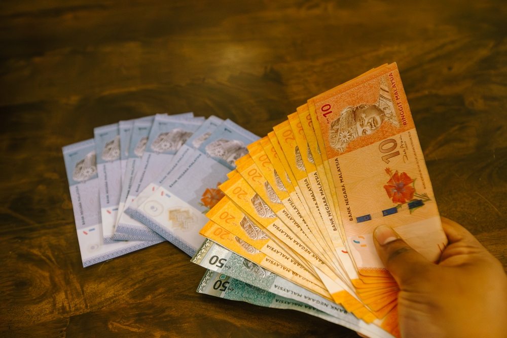Ringgit opens slightly higher against US dollar amid cautious market sentiment