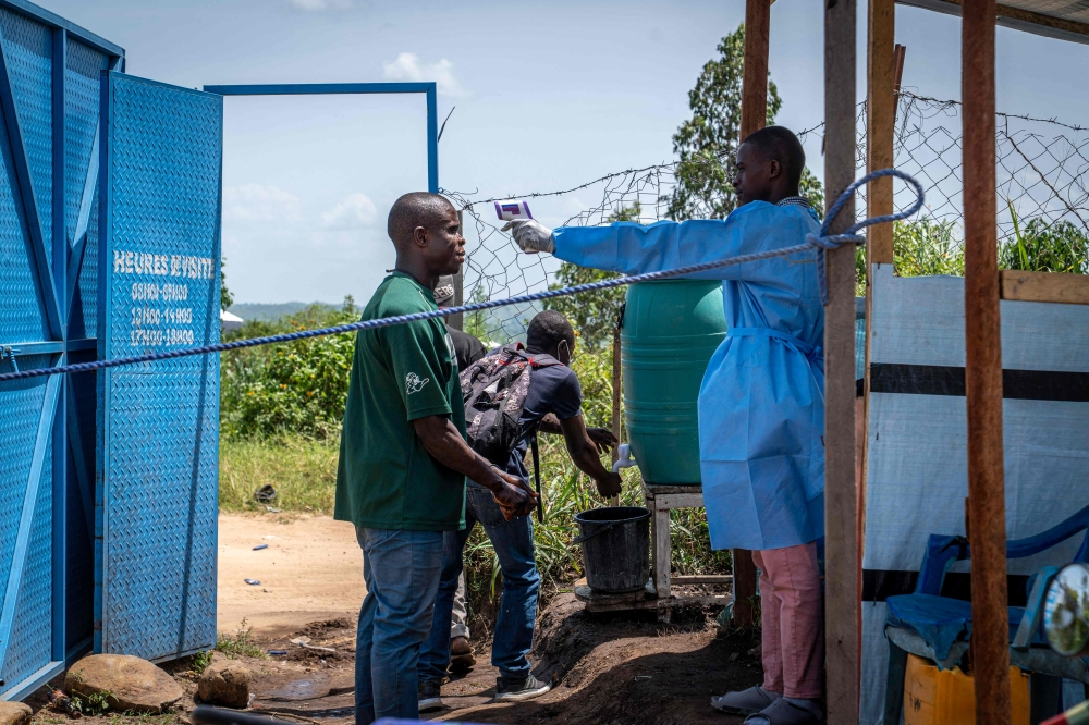 WHO chief says Ebola ‘can be stopped’ as he lands in DR Congo