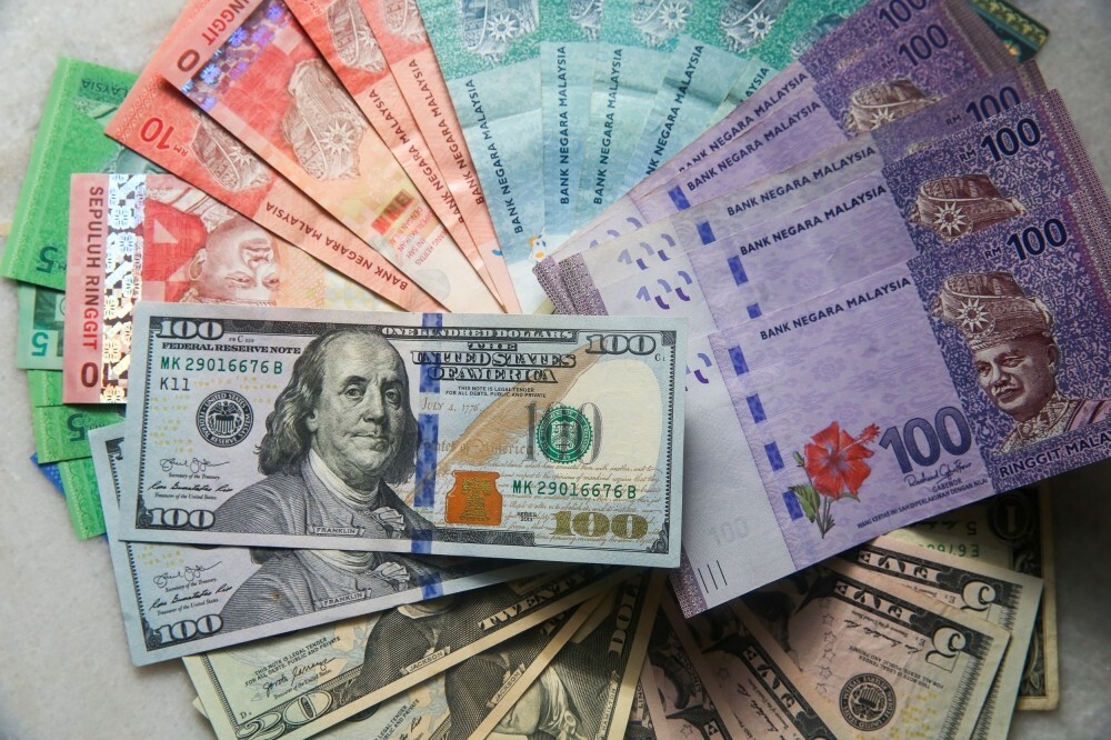 Ringgit opens higher against euro, pound, yen; slips vs greenback