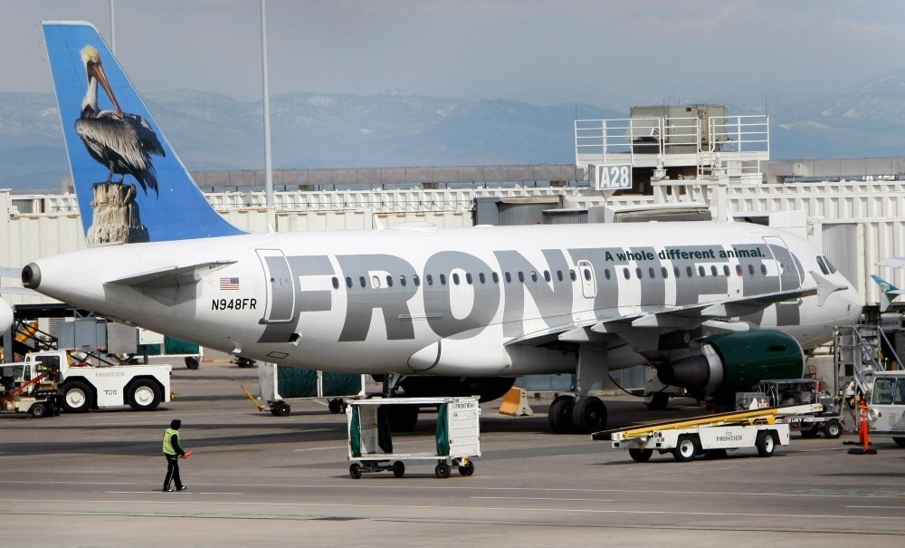 Frontier plane kills trespasser on Denver runway, 12 injured in evacuation after engine fire