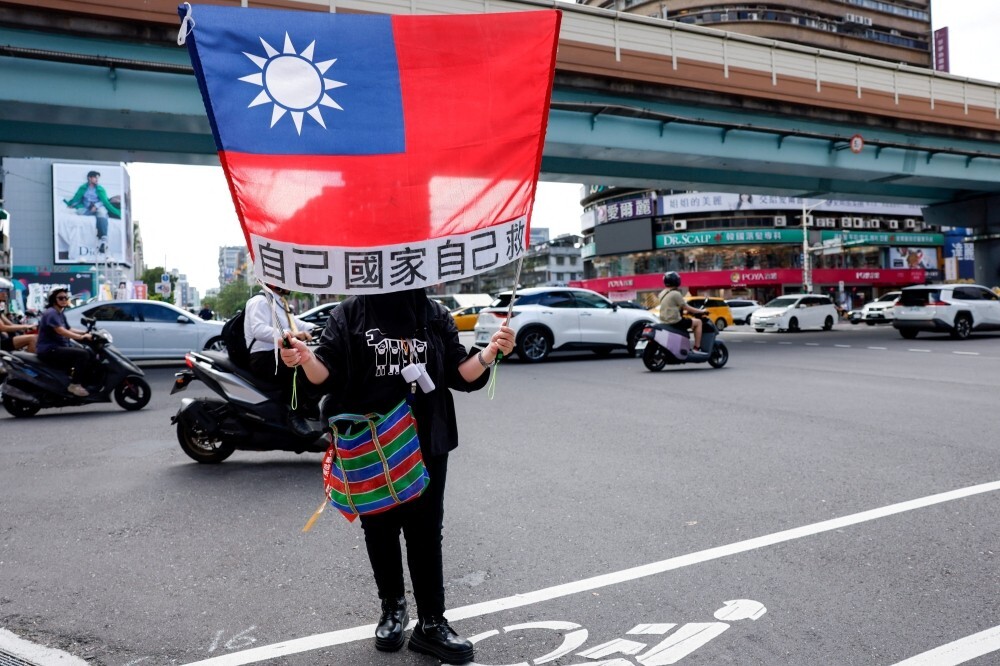 Taiwan says Chinese coast guard ship leaves Pratas waters after tense standoff