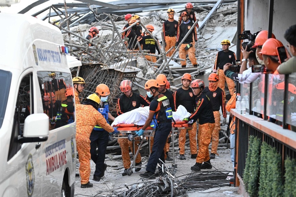 Malaysian among dead after building collapse traps dozens in the Philippines