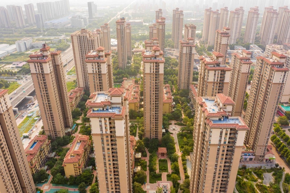 China’s property crisis spreads as homeowners stop paying fees, leaving estates to decay