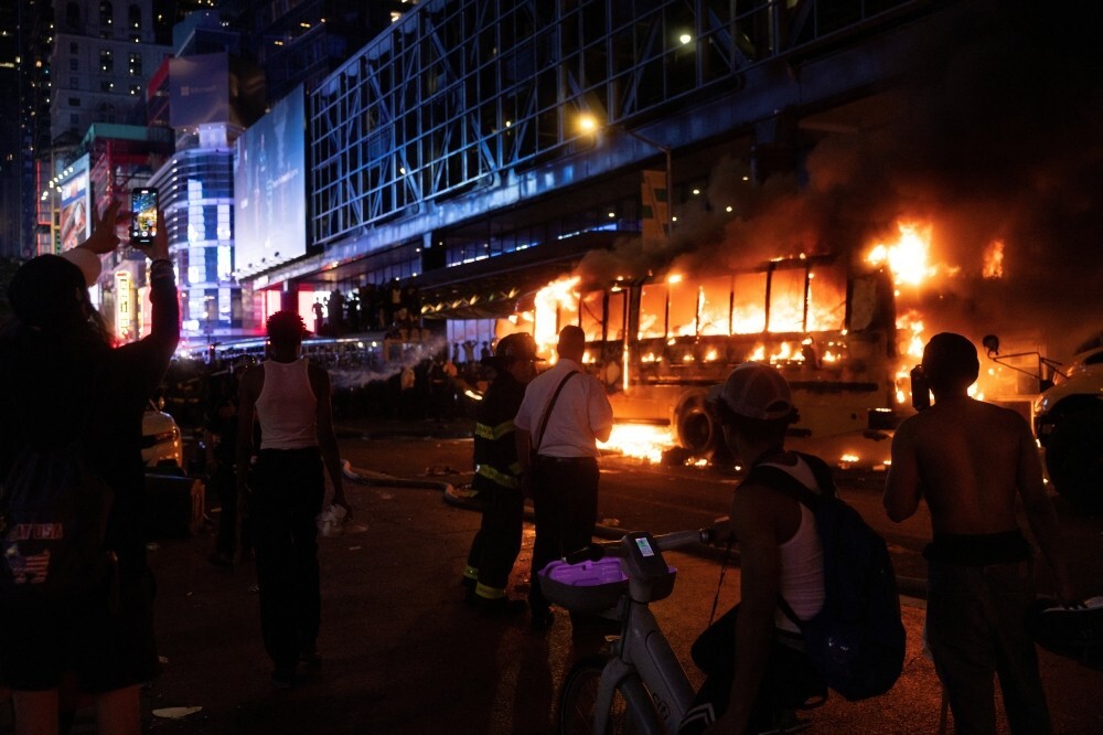 World Cup shuttle bus set alight, teen shot as chaotic celebrations erupt in Manhattan after Knicks win in NBA Finals