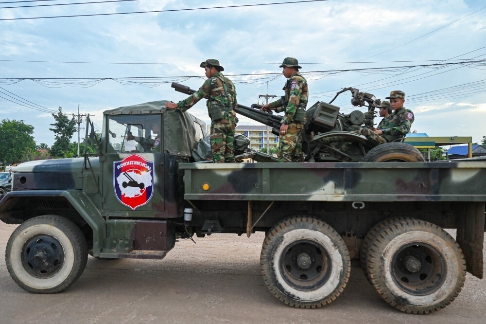 Cambodia upholds 14-year jail terms for journalists in treason case