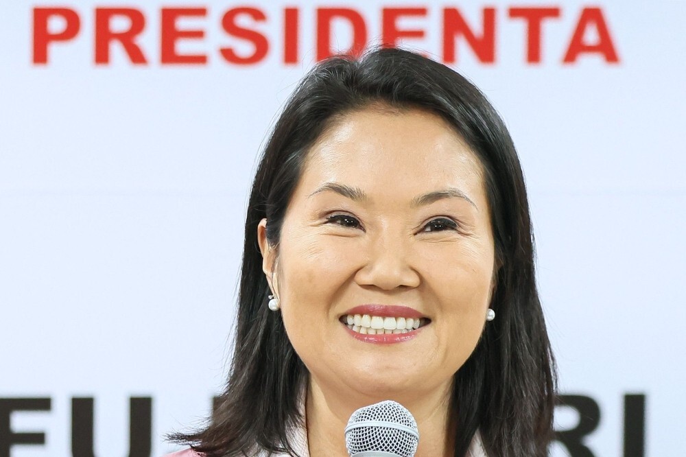 Fourth time lucky as Peruvian political heir Keiko Fujimori wins presidency after razor-thin election victory