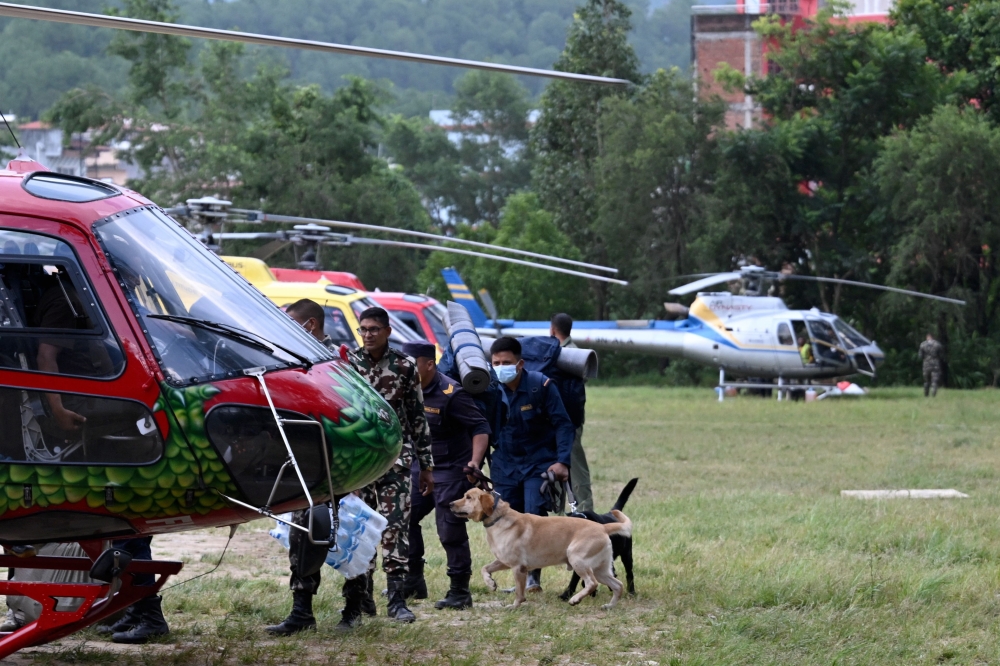 Rescuers send air and camera into Nepal hydropower tunnel after three days, raise hopes for trapped workers