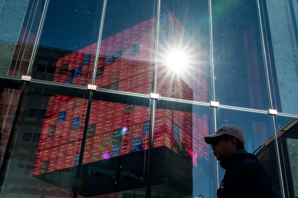 Asian markets mixed as tech rebounds, oil rises and US inflation takes centre stage
